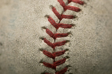 Fototapeta na wymiar Close up of old baseball stiches