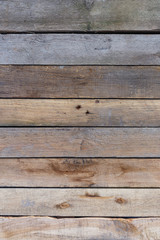 Old wooden boards with knots as a natural background