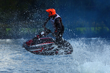  Freestyle Jet Skier performing 360  creating at lot of spray