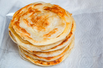 Stack of fried crispy roti, thai style.