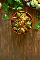 Egg noodles with vegetables in bowl