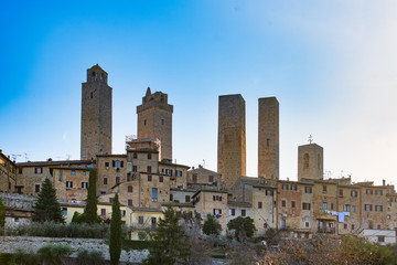 Naklejka premium The medieval village of San Gimignano in tuscany Italy