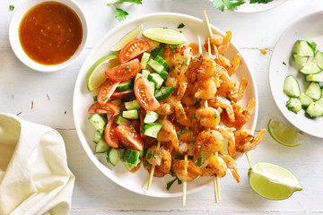 Prawns skewers with sauce