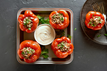 Stuffed red peppers with minced meat, rice, onion
