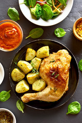 Baked chicken leg with potato