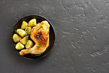 Baked chicken leg with potato