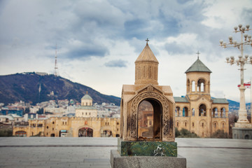 Fototapeta na wymiar Tbilisi Saint Trinity Sameba Cathedral with small copy