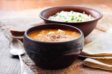 Kapustnyak - traditional Ukrainian winter soup with sauerkraut, millet and meat