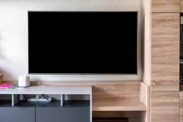 LED Flat Screen TV hanging on wall