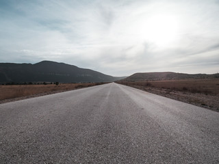 Landscape of empty road on winter day