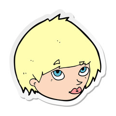 sticker of a cartoon female face looking up