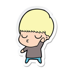 sticker of a cartoon calm boy