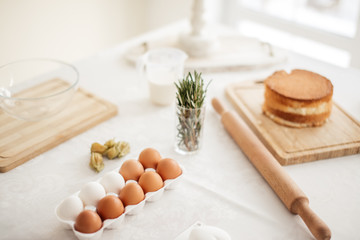 woman has left the ingredients for cooking cake, close up photo. lifestyle,household chores