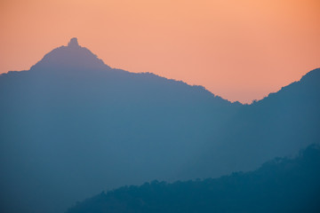 Obraz premium Sunset at mountain in Champasak town, Laos