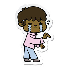 sticker of a crying boy cartoon