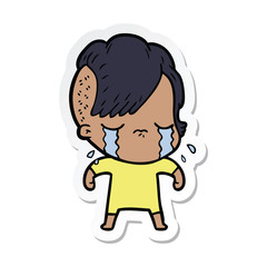 sticker of a cartoon crying girl