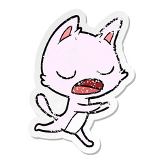 distressed sticker of a talking cat cartoon