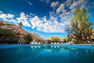 View of ancient Nevsehir cave town and a castle of Uchisar dug from a mountains in Cappadocia, Central Anatolia,Turkey