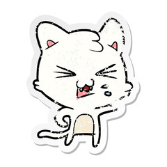 distressed sticker of a cartoon hissing cat