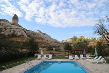 View of ancient Nevsehir cave town and a castle of Uchisar dug from a mountains in Cappadocia, Central Anatolia,Turkey