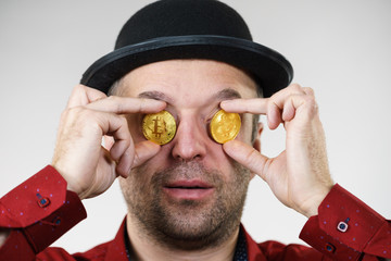 Man having bitcoin in eye