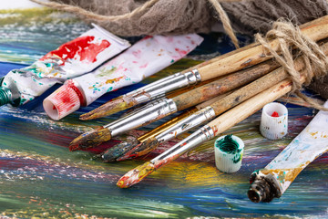 Paint brushes and paints for drawing.