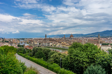 Fototapeta na wymiar Panaromic view of Florence with Basilica Santa Croce and City gate of San Niccolo and Duomo and Ponte Vecchio viewed from Piazzale Michelangelo (Michelangelo Square)