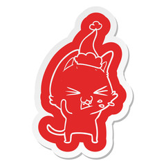 cartoon  sticker of a cat hissing wearing santa hat