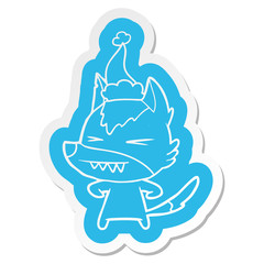 angry wolf cartoon  sticker of a wearing santa hat