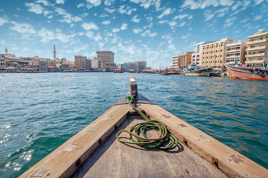 DUBAI, UAE Boats on the Bay Creek.View of traditional arabic buildings at Al Fahidi Historical District, Bastakiya