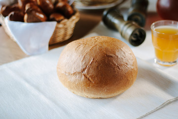 Fresh and hot bread on table
