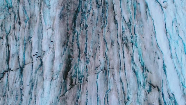 Incredible view from above of a blue iced glacier walk.