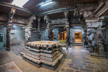 Fototapeta na wymiar Tirunelveli, Tamil Nadu, India, November 10, 2018: Ancient stone statues in the altar of the Hindu temple in Tirunelveli, Tamil Nadu, South India