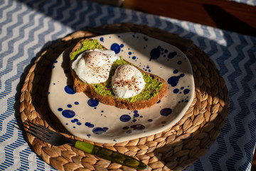 Avocado toast with poached eggs