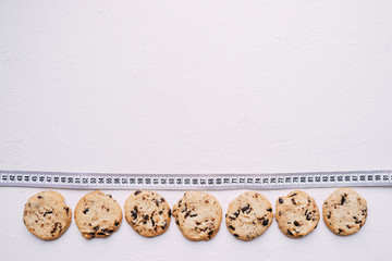 healthy lifestyle decision, diet restrict, carbs reduce, sugar, sweets. chocolate cookie background...