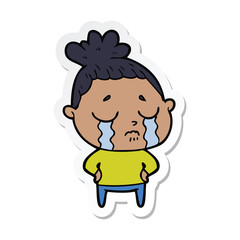 sticker of a cartoon crying woman