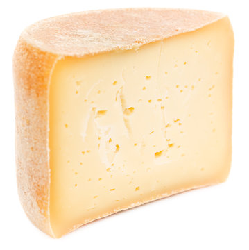 Half of wheel cheese isolated on white