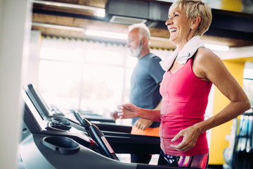 Image of attractive fit senior woman in gym