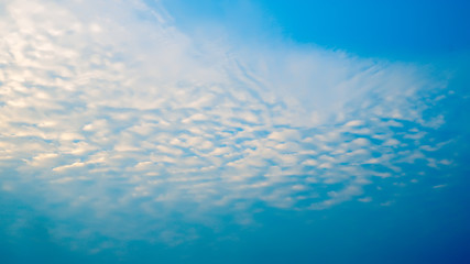 white clouds with blue sky in background, clouds in horizon blue sky