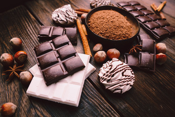 dark and white chocolate pieces, crushed choco bars and cocoa powder, sweet food, culinary...