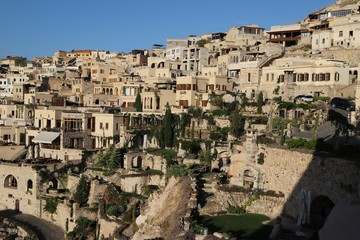 View of ancient Nevsehir cave town and a castle of Uchisar dug from a mountains in Cappadocia, Central Anatolia,Turkey