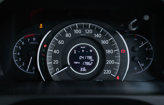 Close up of modern speedometer display in a car dashboard panel . - Powered by Adobe