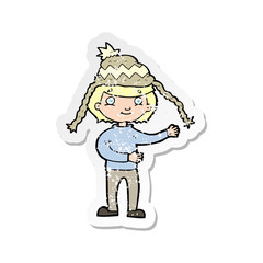 retro distressed sticker of a cartoon man wearing winter hat