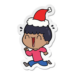 laughing sticker cartoon of a man wearing santa hat