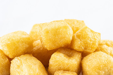Golden oil tofu on white background