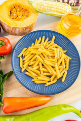 Fresh vegetables melon and pasta / nutrition concept background material