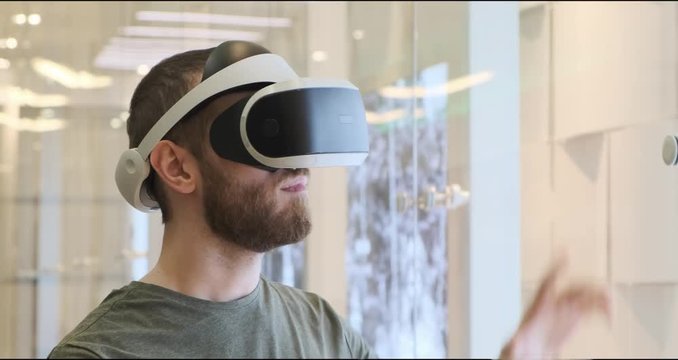Man using virtual reality headset indoors 4k