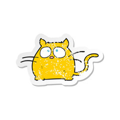 retro distressed sticker of a cartoon cat