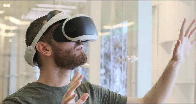 Man using virtual reality headset indoors 4k
