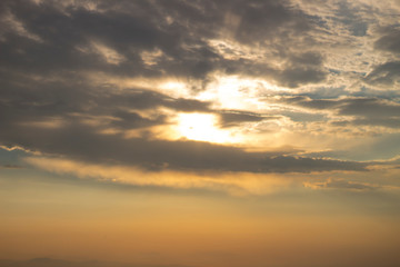 Fototapeta na wymiar Sun between clouds
